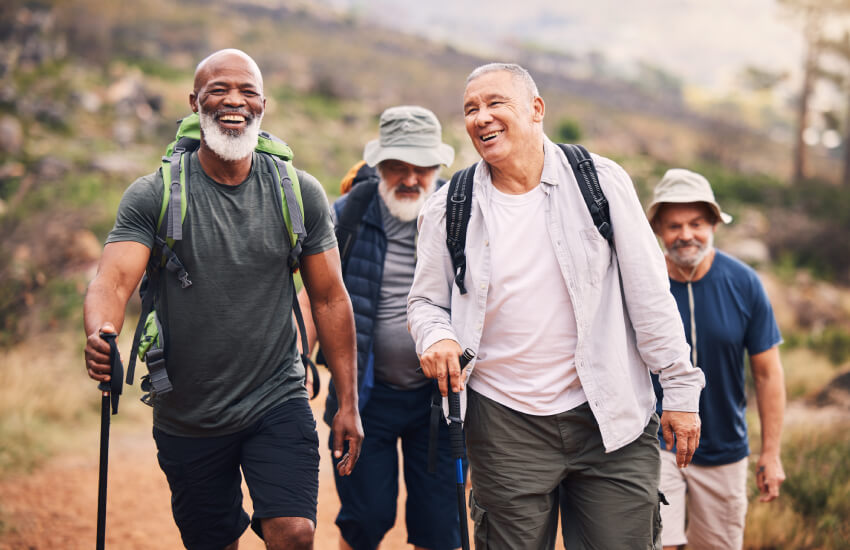 A group of old men hiking on mountain