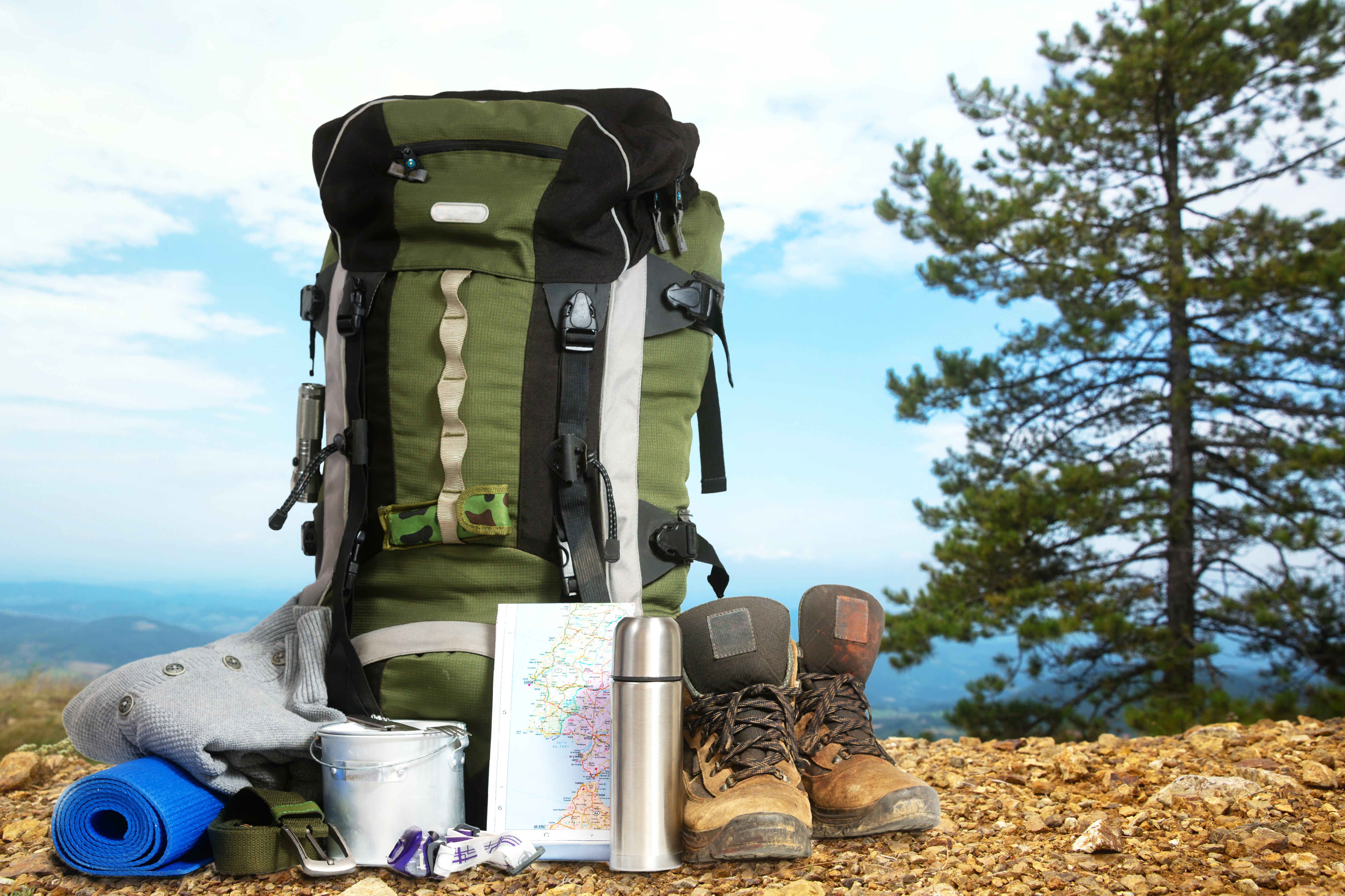 Trekking equipment on top of a mountain. 